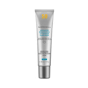 A 40ml squeeze tube of SkinCeuticals Advanced Brightening UV Defense Sunscreen SPF 50, featuring a metallic silver body with blue and yellow text, set against a plain white background.