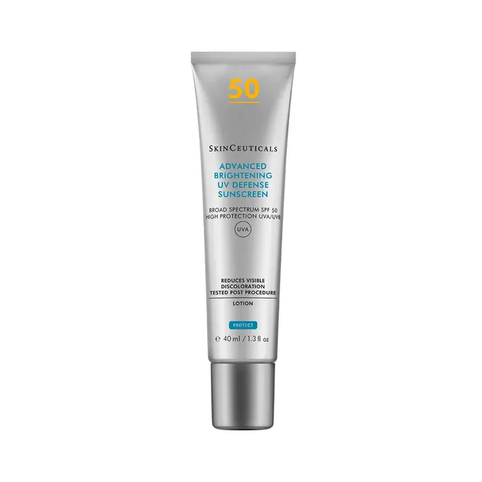 A 40ml squeeze tube of SkinCeuticals Advanced Brightening UV Defense Sunscreen SPF 50, featuring a metallic silver body with blue and yellow text, set against a plain white background.