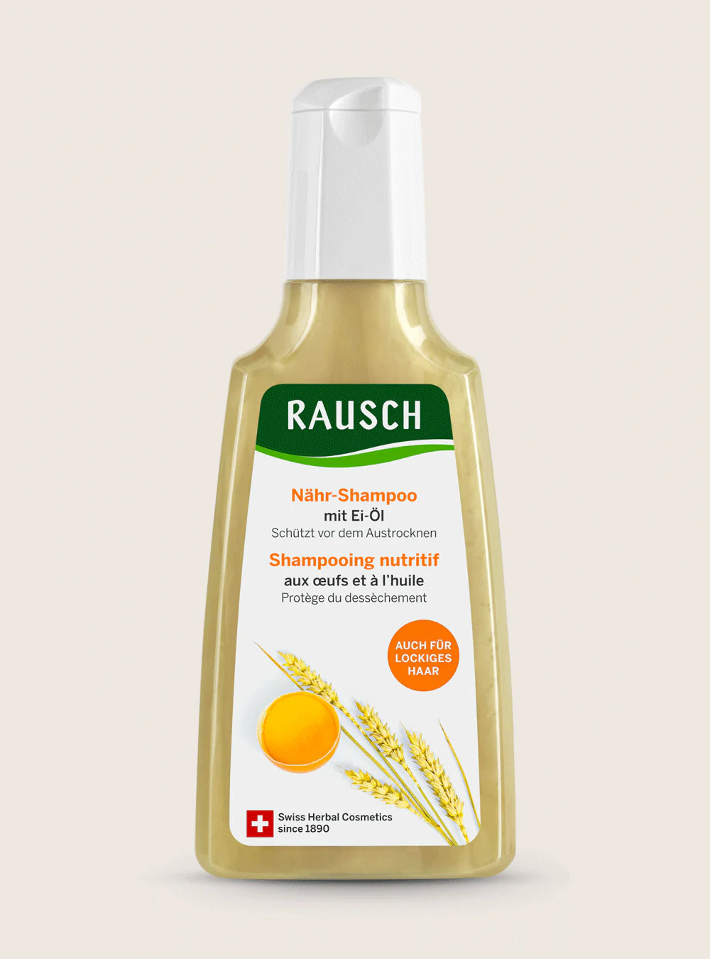 A bottle of Rausch Nähr-Shampoo (nutritive shampoo) with Eri-Oil, featuring a white cap and a label with green, orange, and yellow graphics on a light beige background.