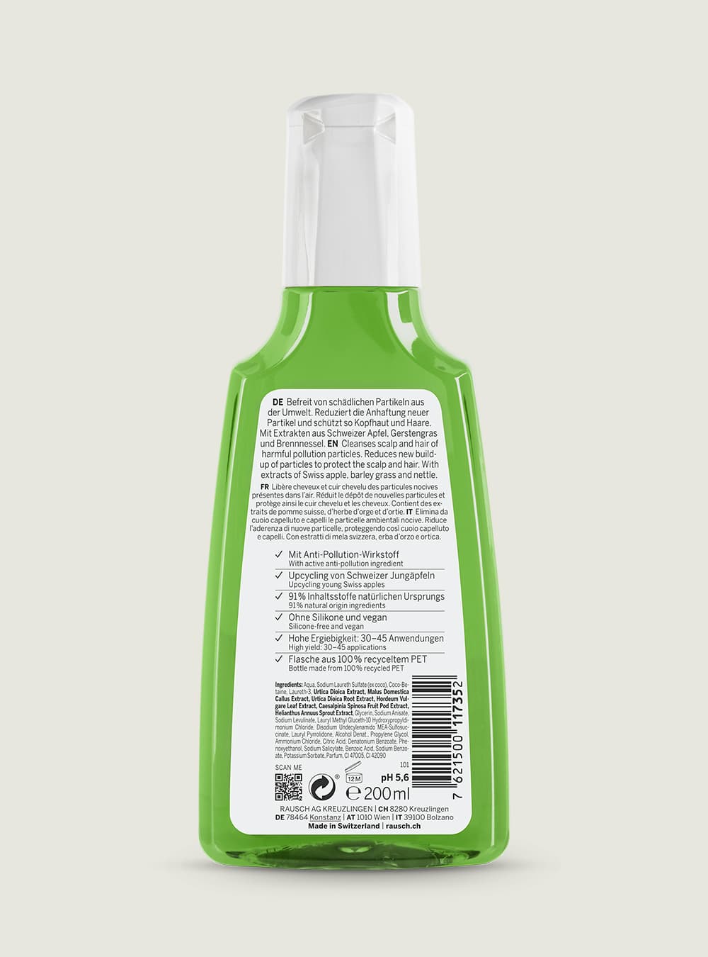 Green bottle with label on a white background