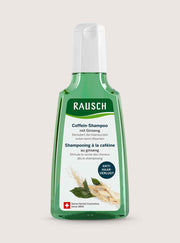 A bottle of Rausch Caffeine Shampoo with Ginseng, featuring a translucent green bottle, white cap, and a white label with green and blue accents, set against a solid light beige background.