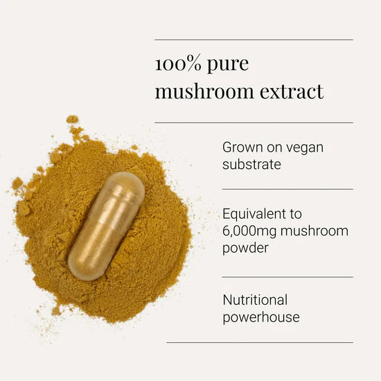 Gold capsule and mushroom powder on a light beige background with text about 100% pure mushroom extract.