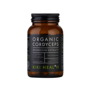 A bottle of Kiki Health Organic Cordyceps Mushroom Extract dietary supplement, featuring an amber glass bottle with a black cap and a black label with white and lime green text.
