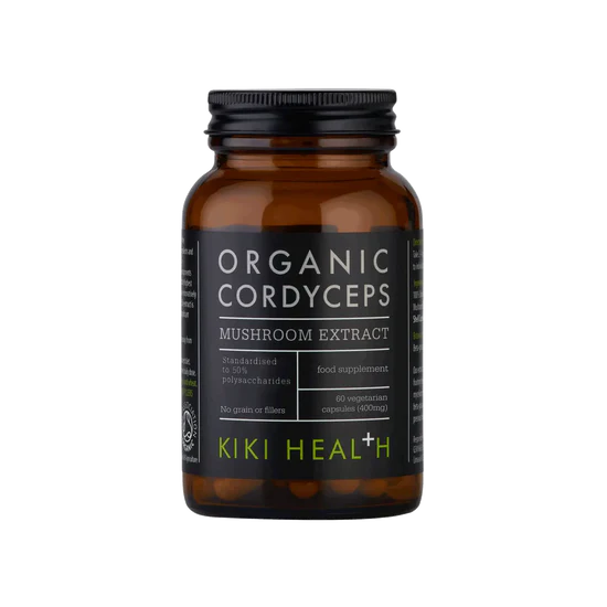 A bottle of Kiki Health Organic Cordyceps Mushroom Extract dietary supplement, featuring an amber glass bottle with a black cap and a black label with white and lime green text.