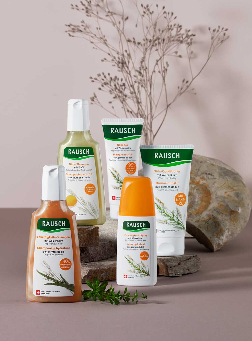 RAUSCH skincare products on a neutral background with decorative elements