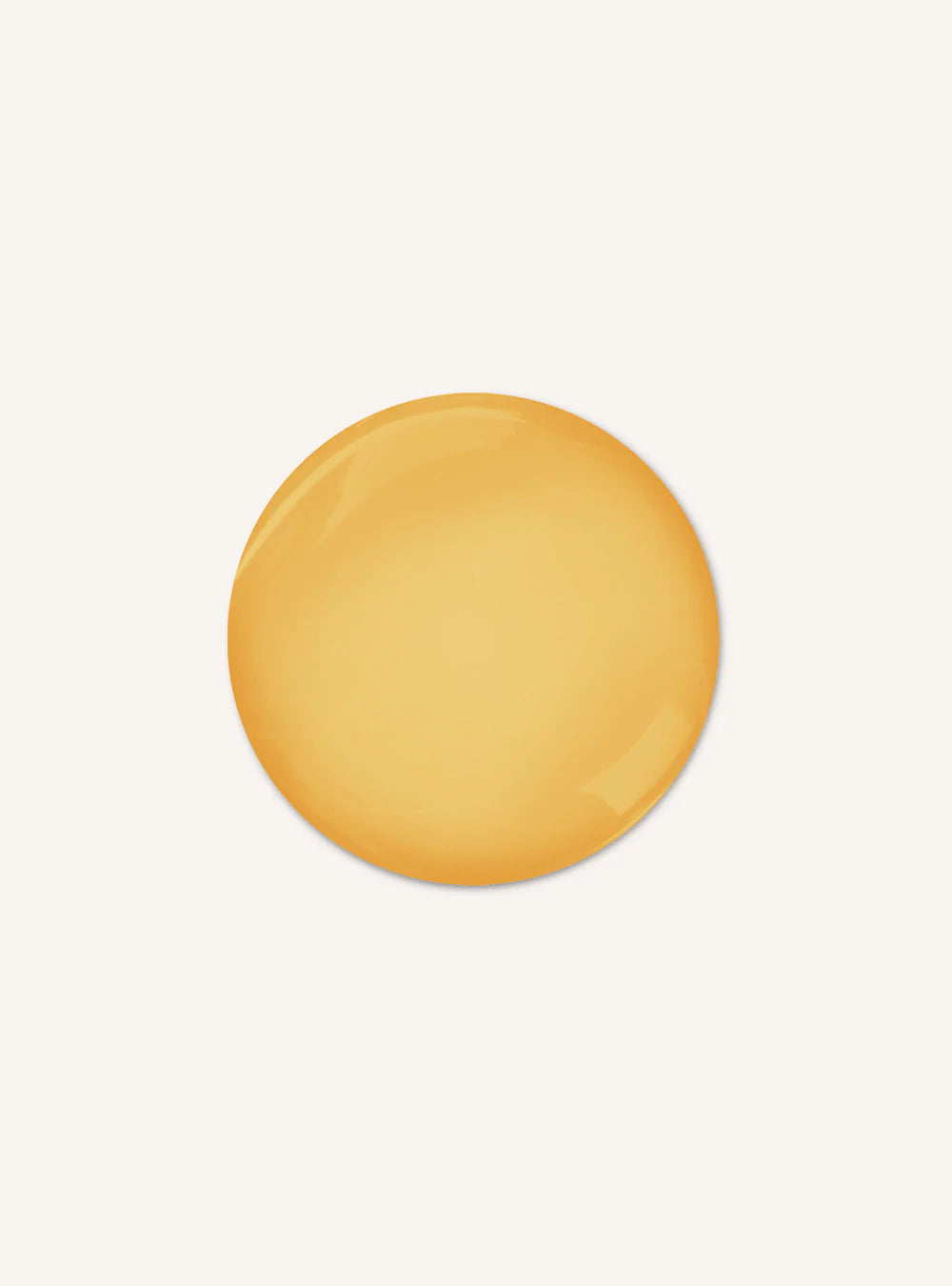 A smooth, glossy circular swatch of warm golden yellow color centered on a light off-white background.