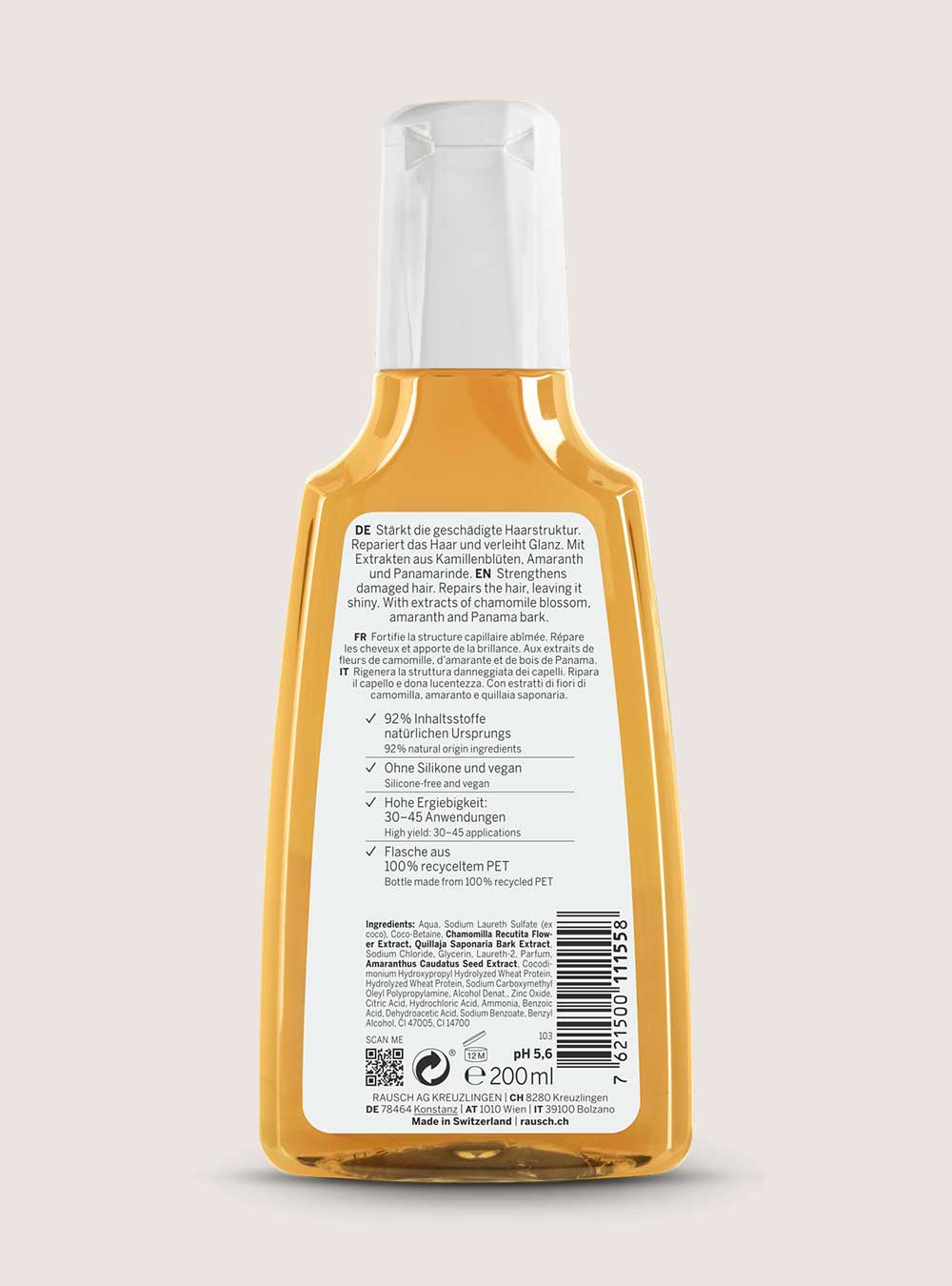 Back view of a yellow bottle with text on a light pink background