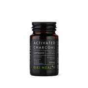 A bottle of Kiki Health Activated Charcoal Capsules on a clean white background. The product is in an amber glass bottle with a black ribbed cap and a black label featuring white text and lime green accents.