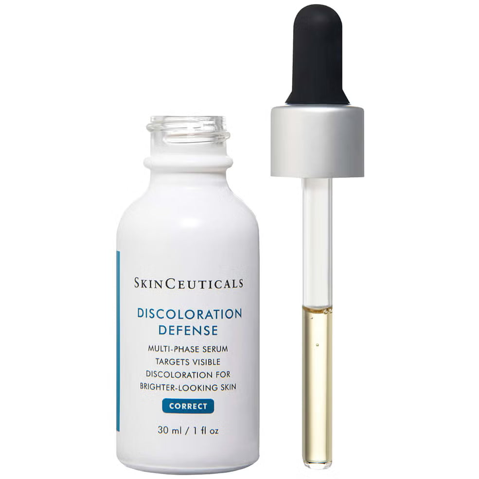 SkinCeuticals Discoloration Defense serum bottle with dropper on a white background