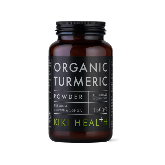 A dark amber glass bottle of Kiki Health Organic Turmeric Powder with a black label and black cap, set against a plain white background.